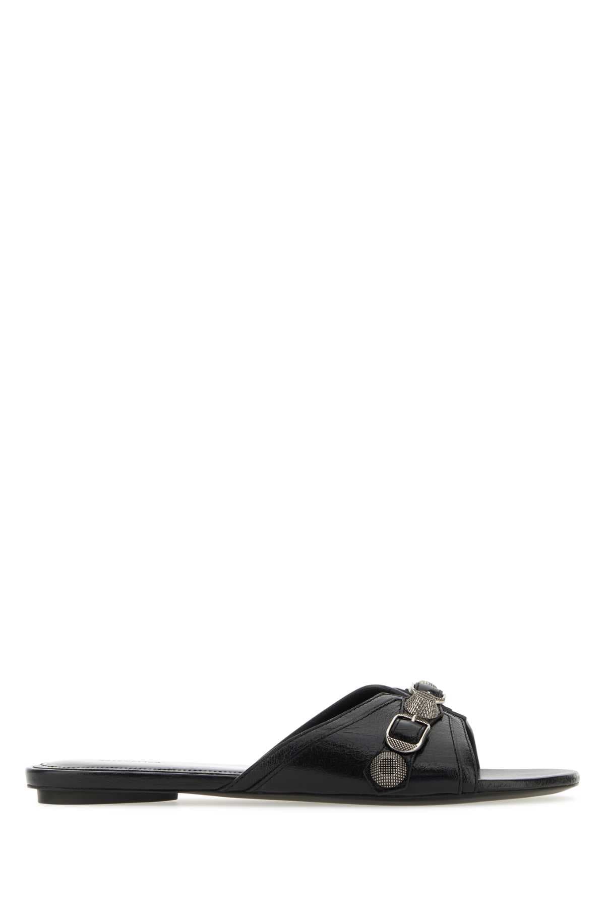 Black leather slippers