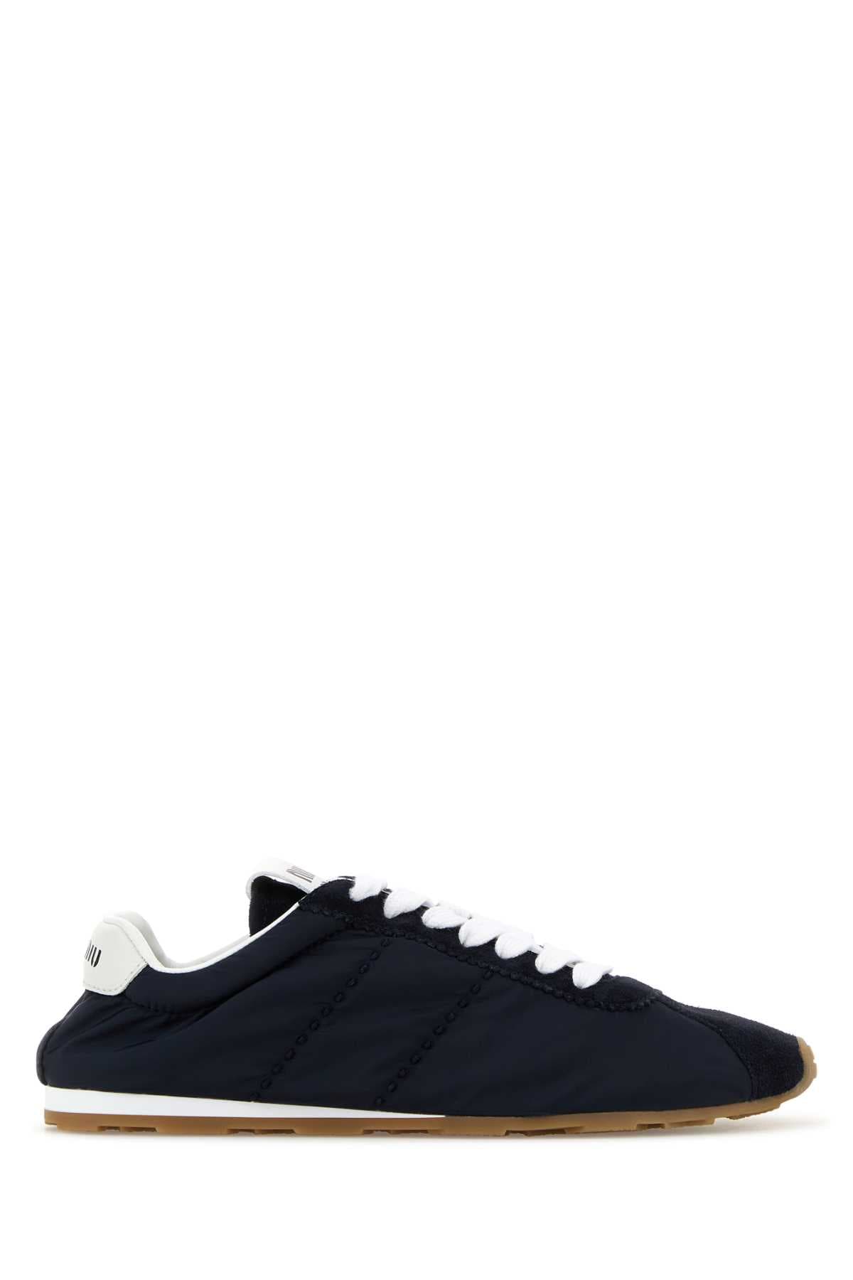 Navy blue fabric and suede sneakers