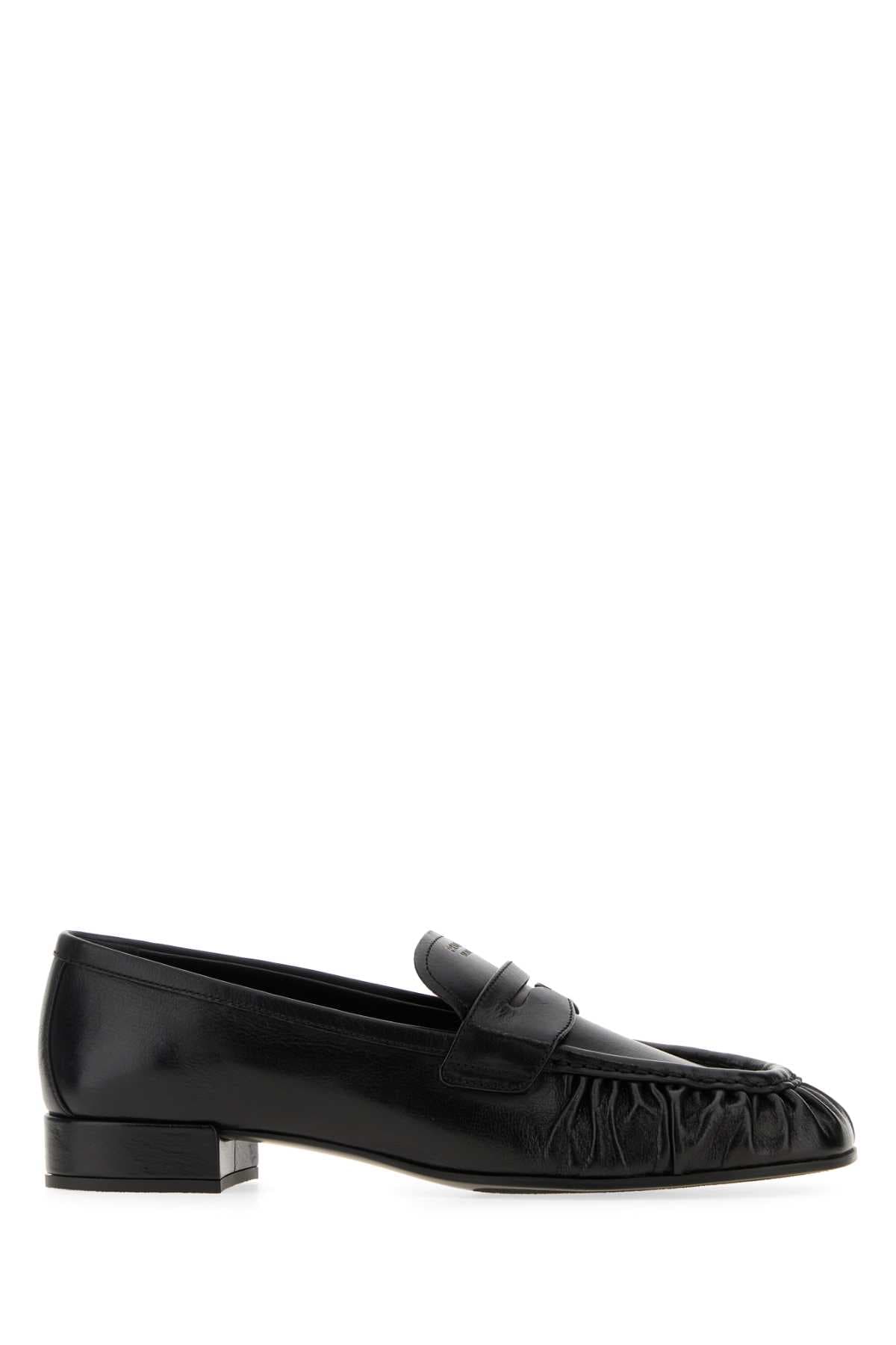 Black leather loafers