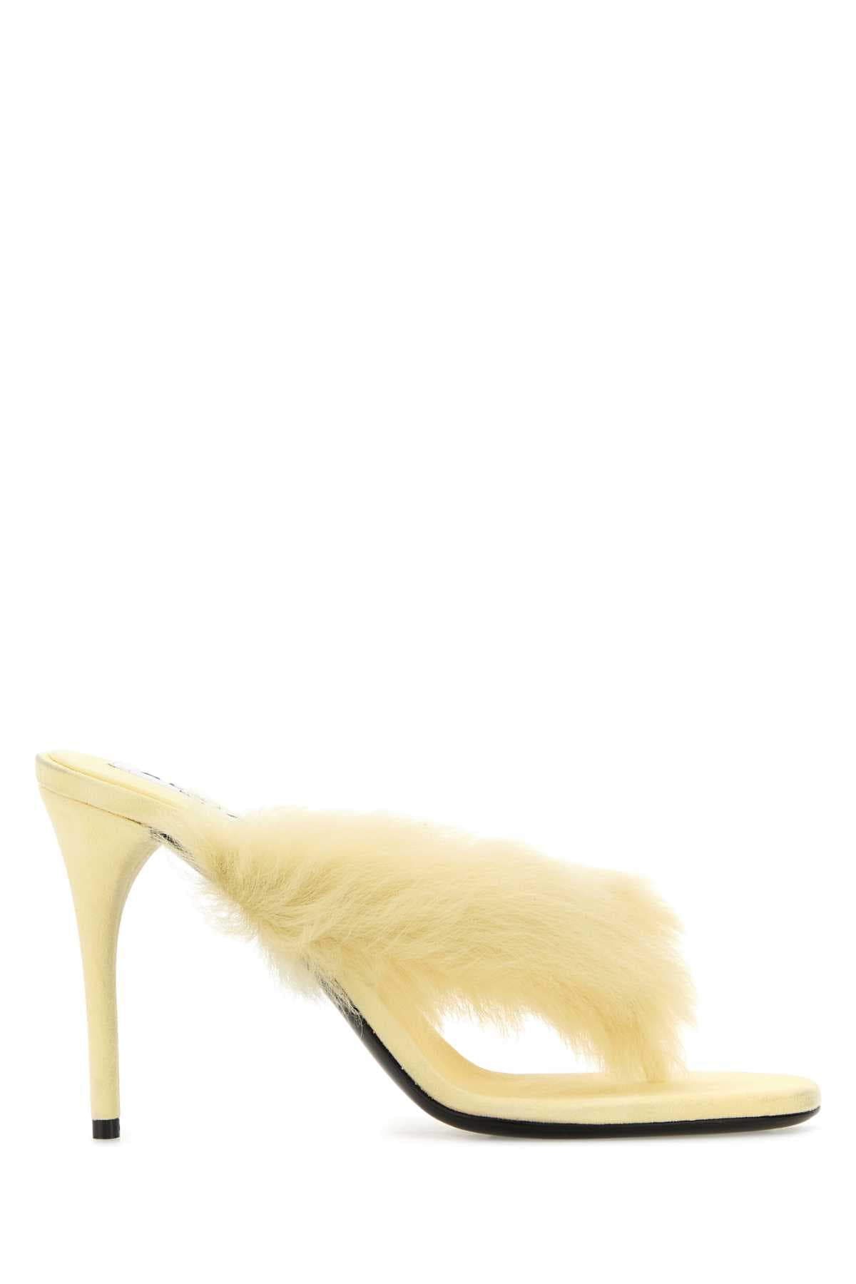 Pastel yellow leather thong mules