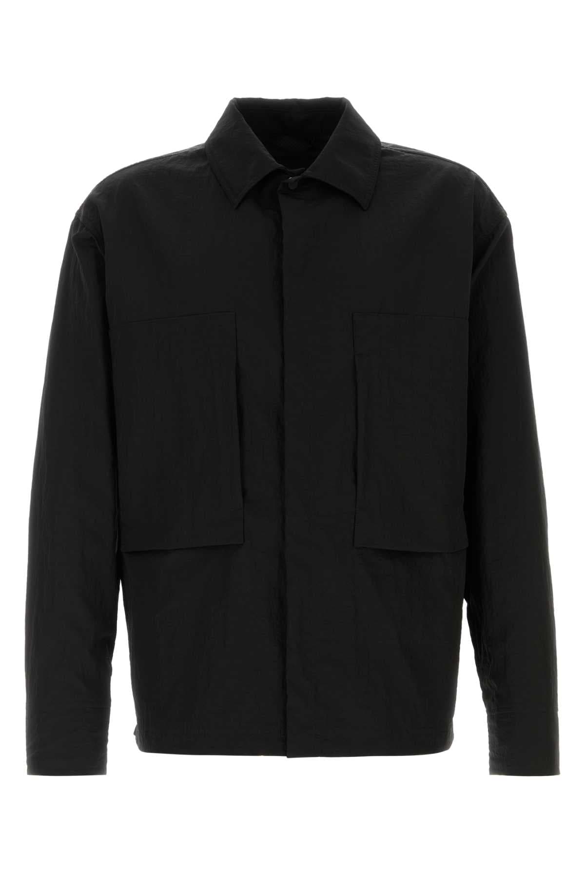 Black nylon windbreaker
