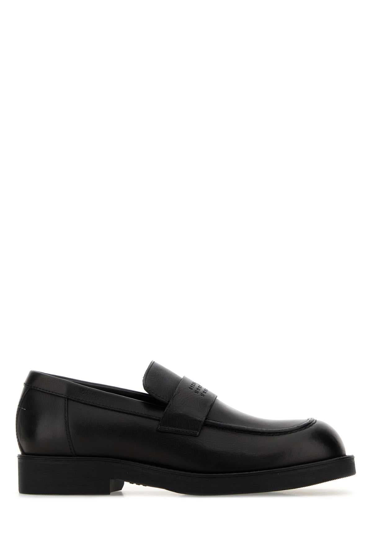Black leather loafers