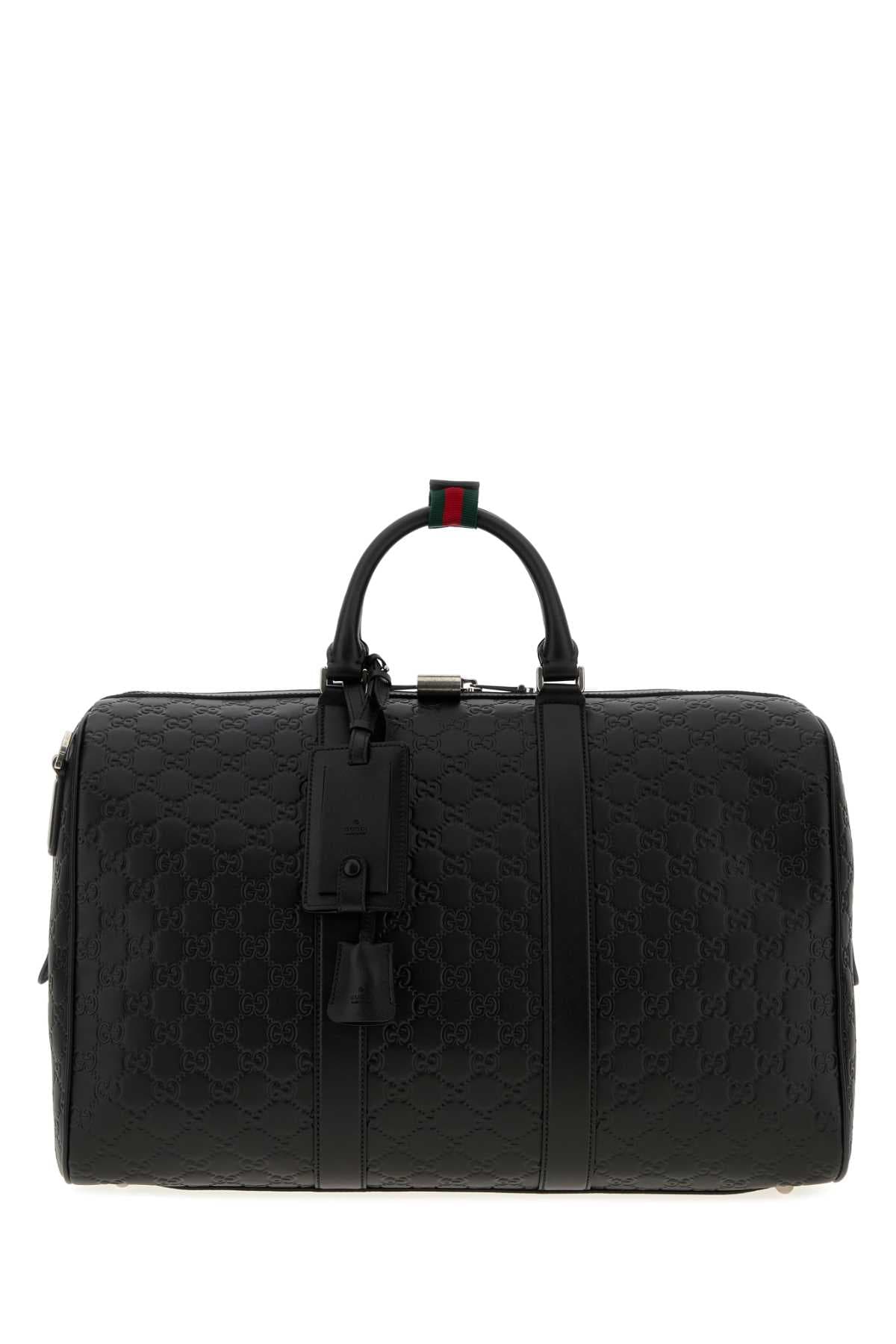 Black leather Emblem travel bag