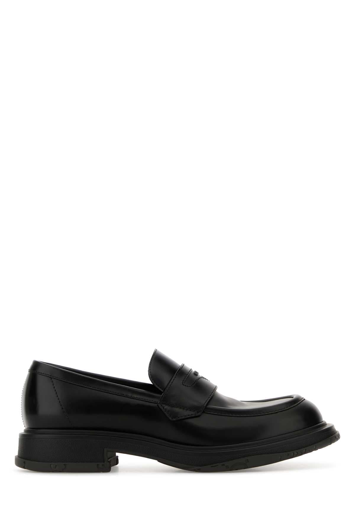 Black leather loafers