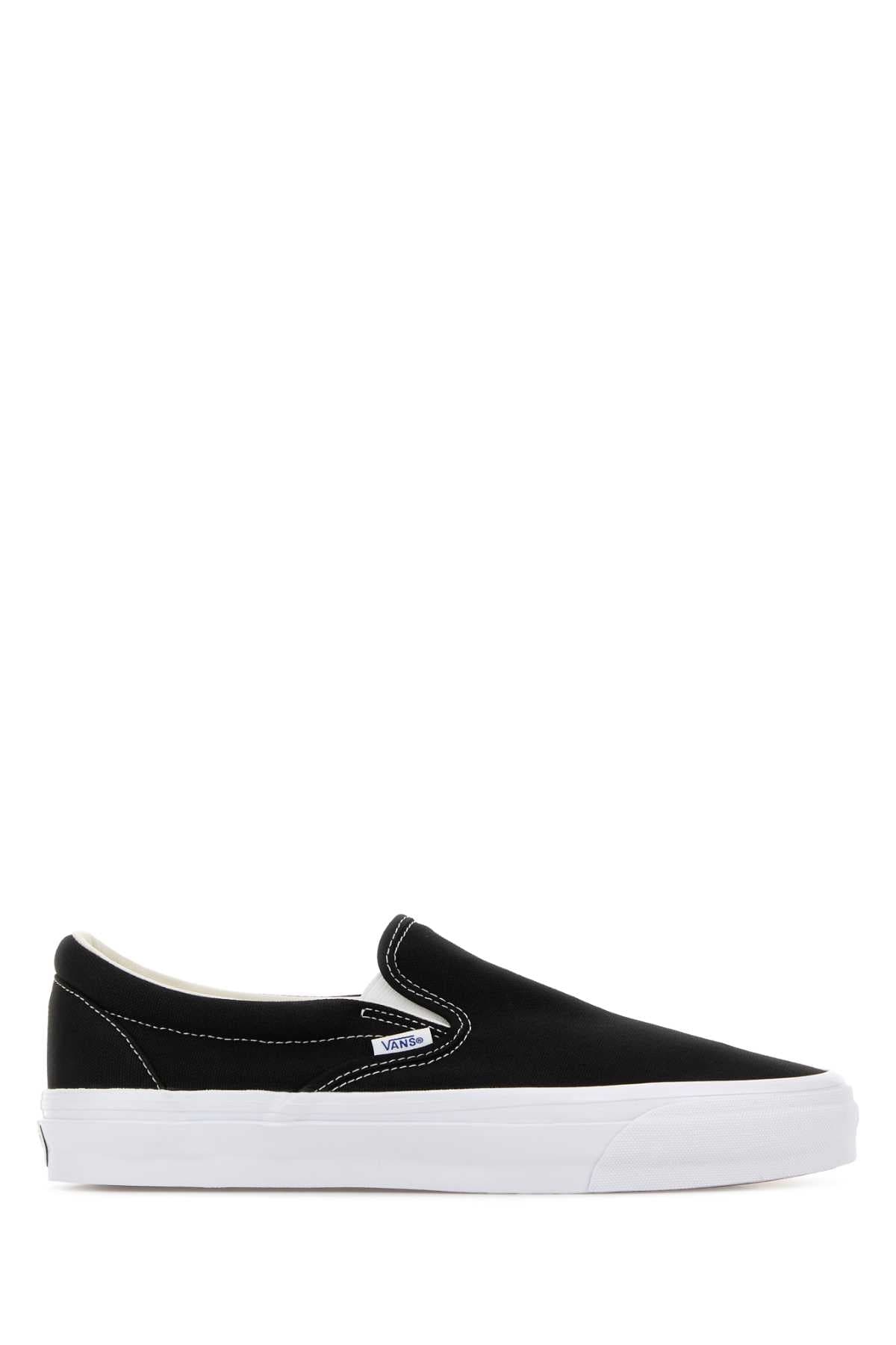 Black canvas Reissue slip ons
