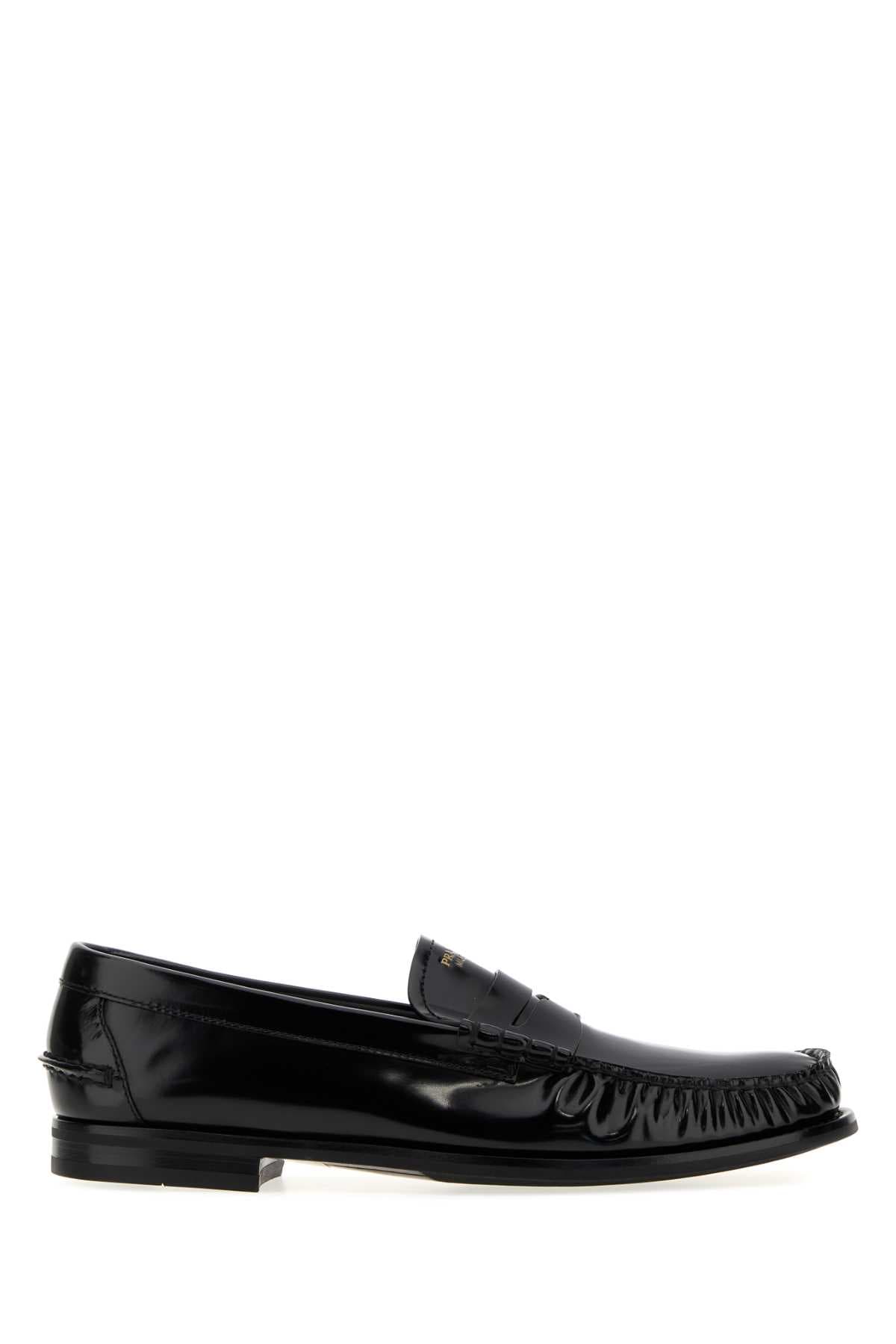 Black leather loafers