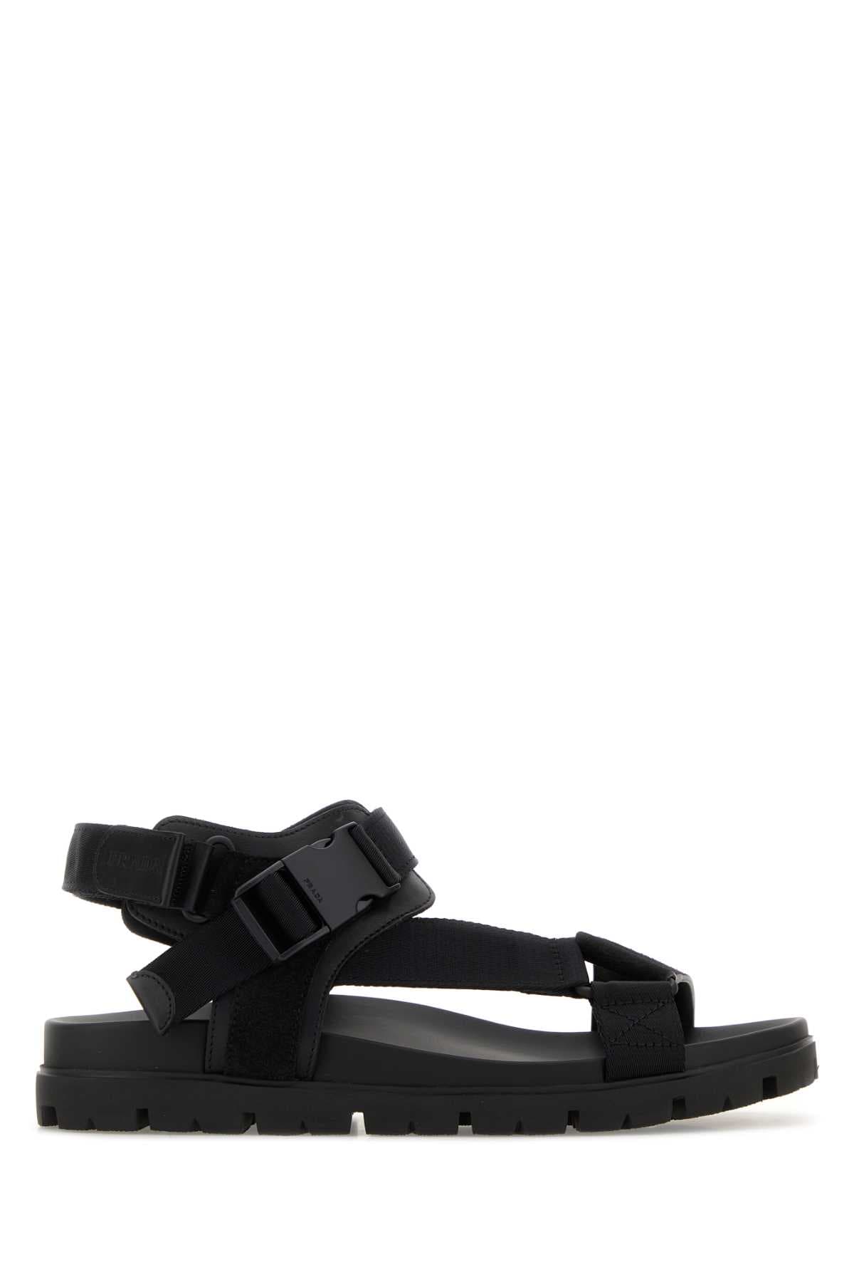 Black fabric and suede sandals