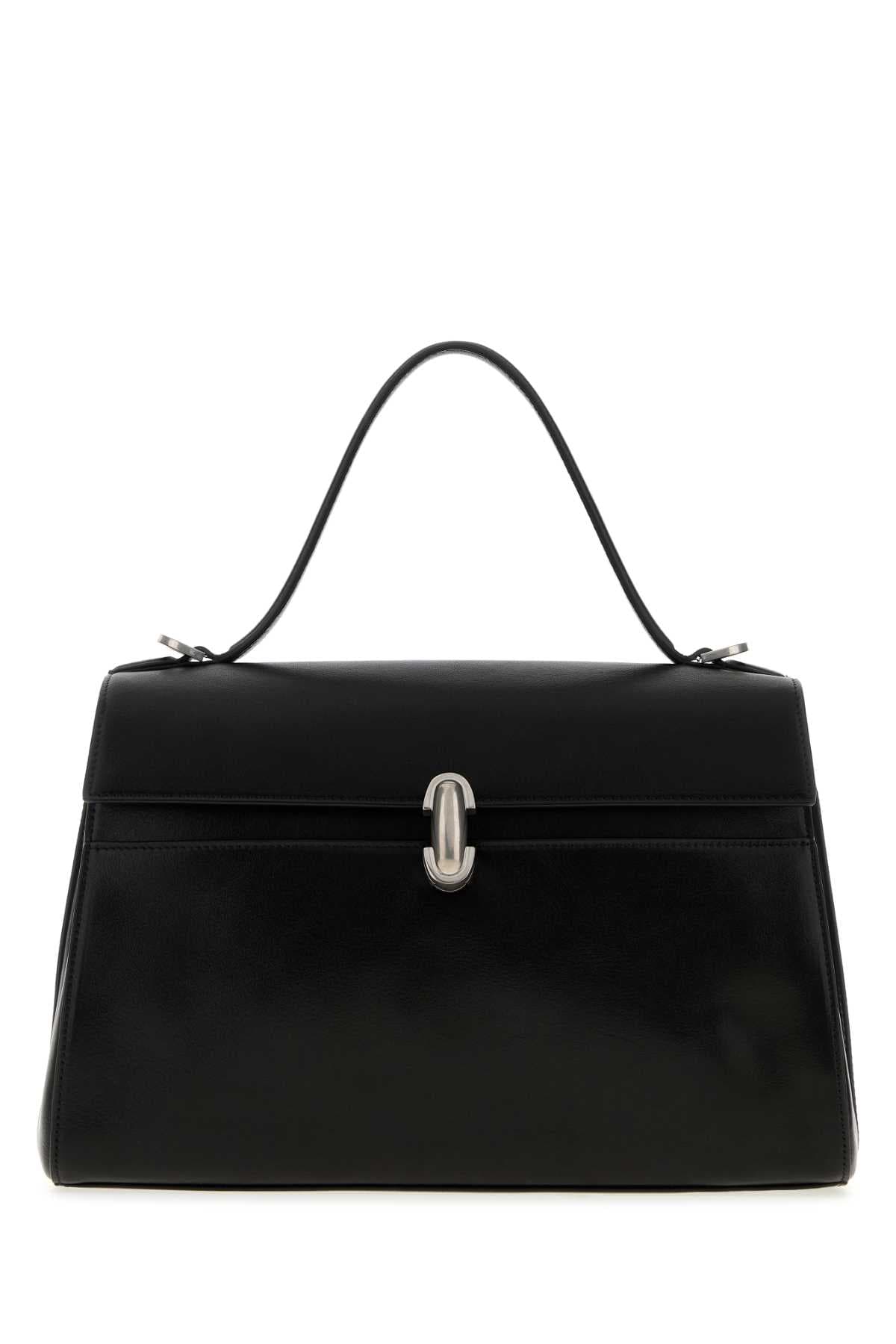 SOFT SYMMETRY IN VINTAGE CALF LEATHER