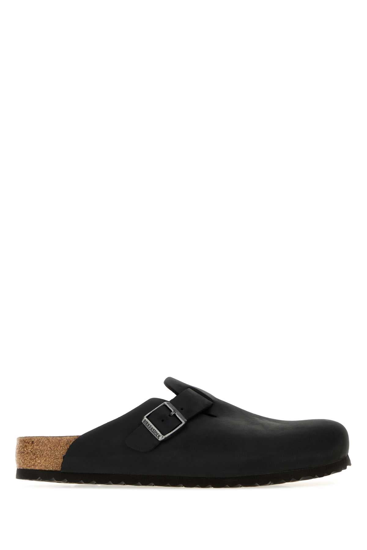 Black leather Boston slippers