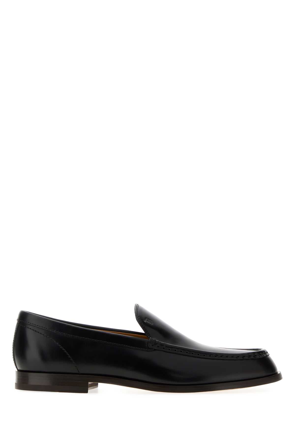 Black leather loafers