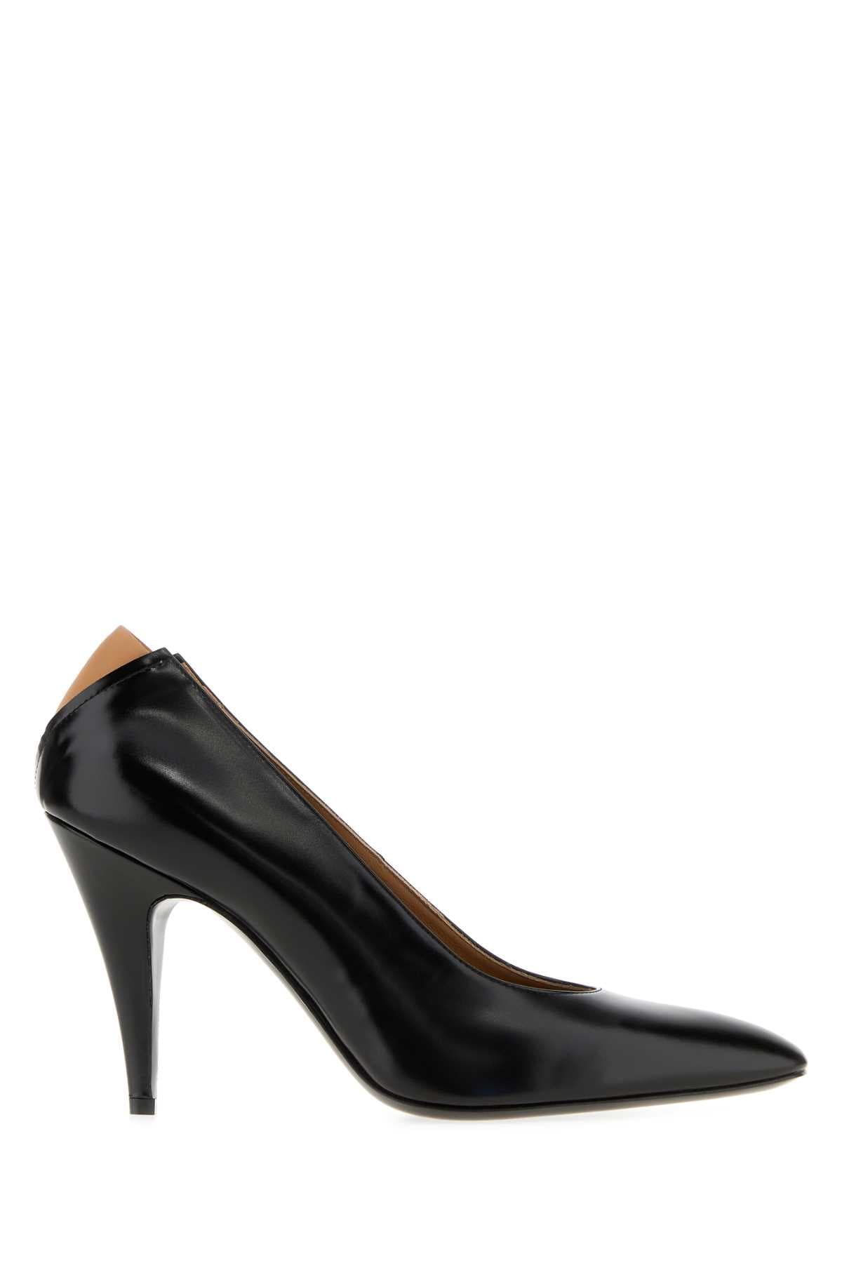 Black leather Alma pumps