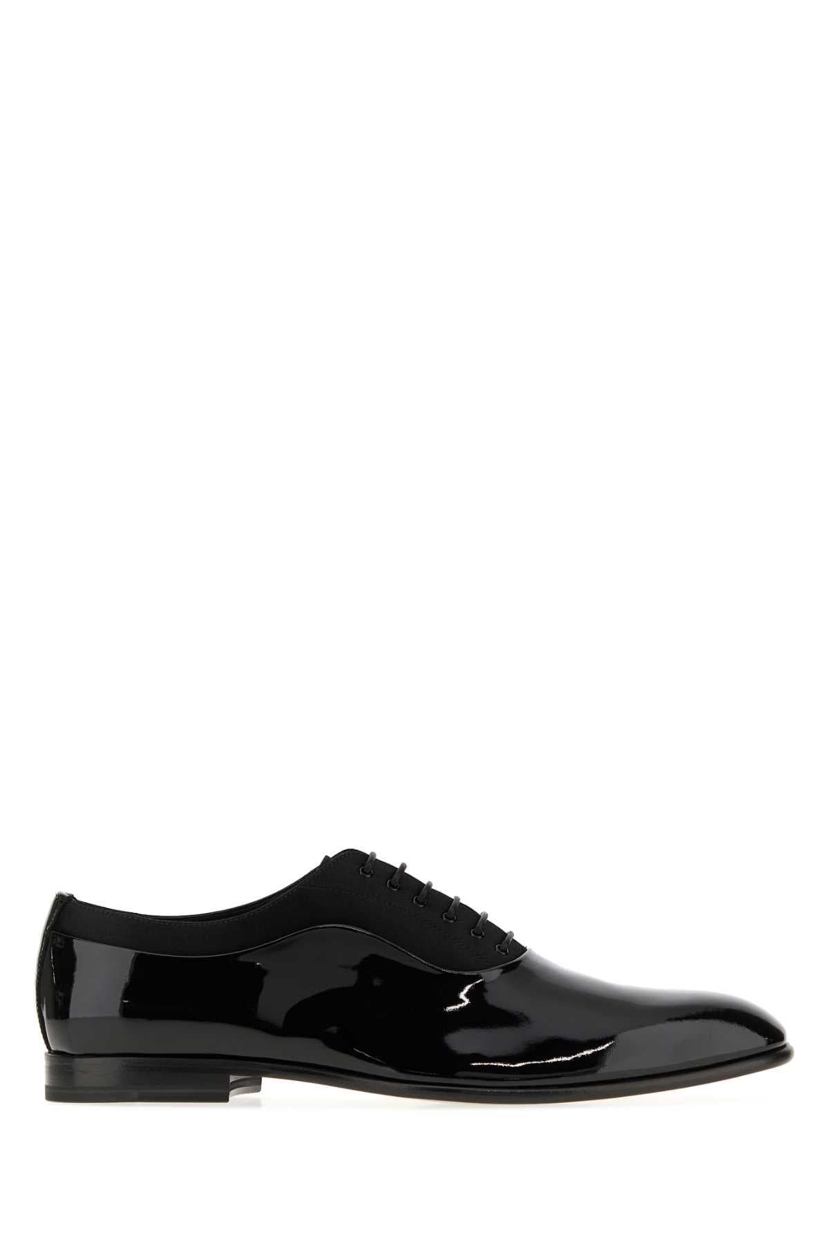 Black leather and satin lace-up shoes