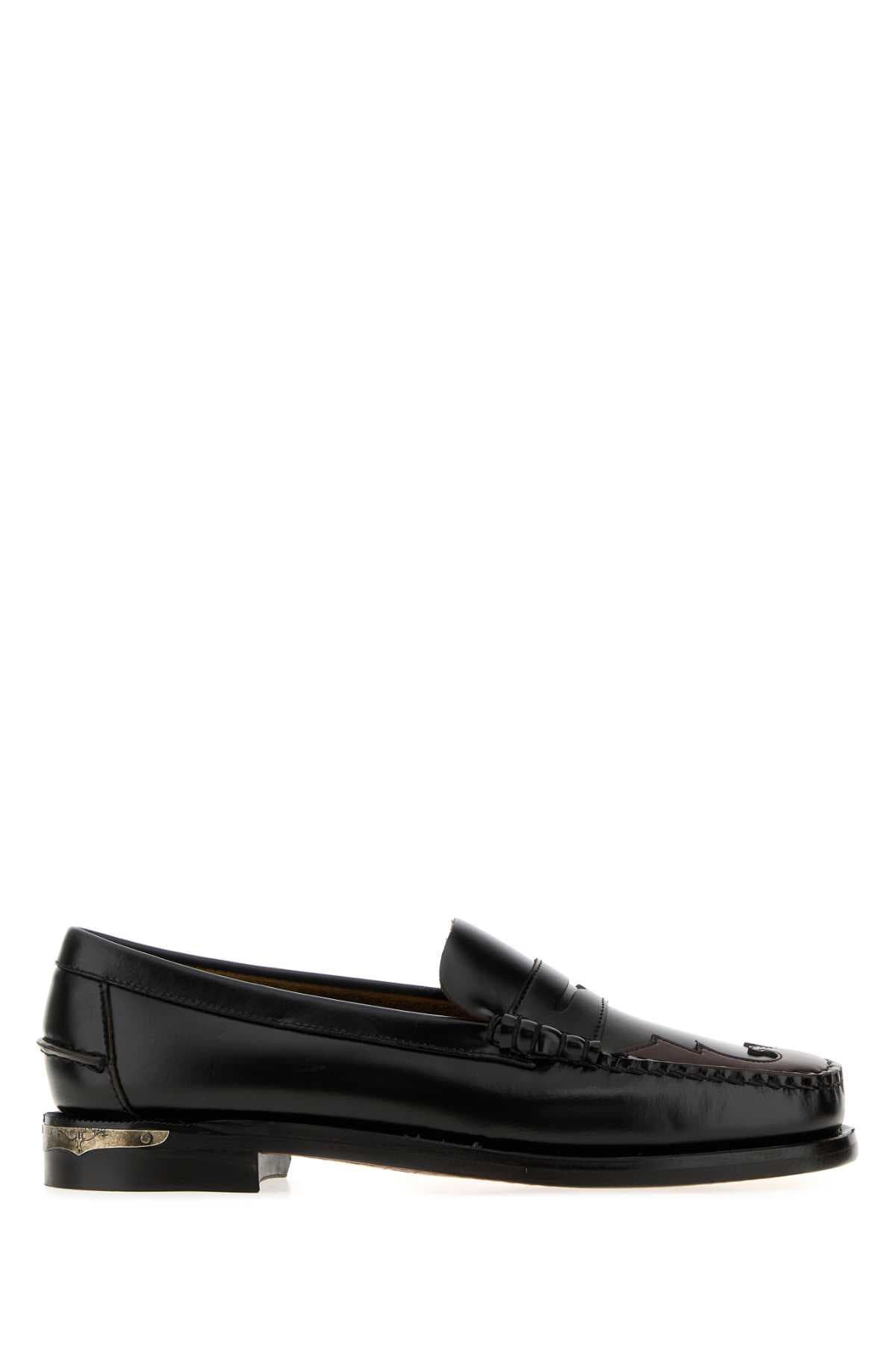 Black leather Dan Scarabeo loafers