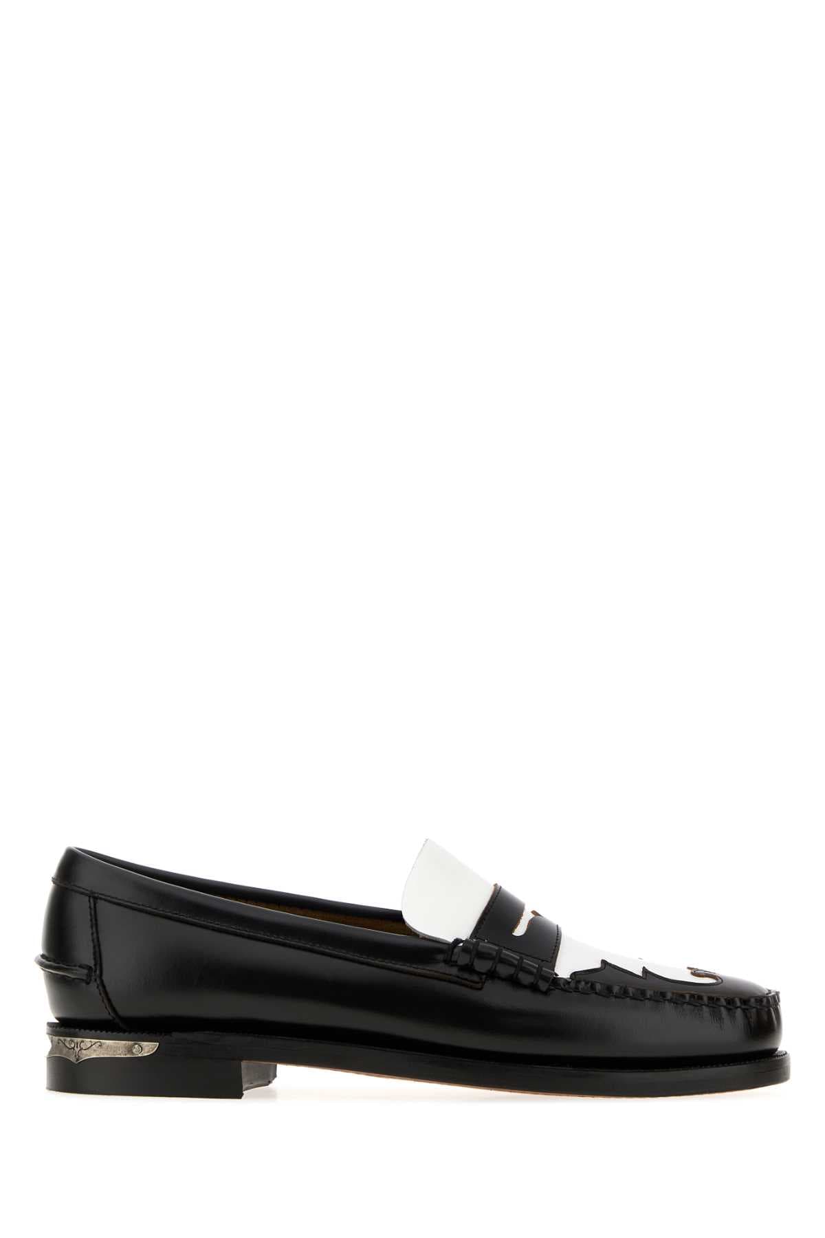 Black leather Dan Scarabeo loafers