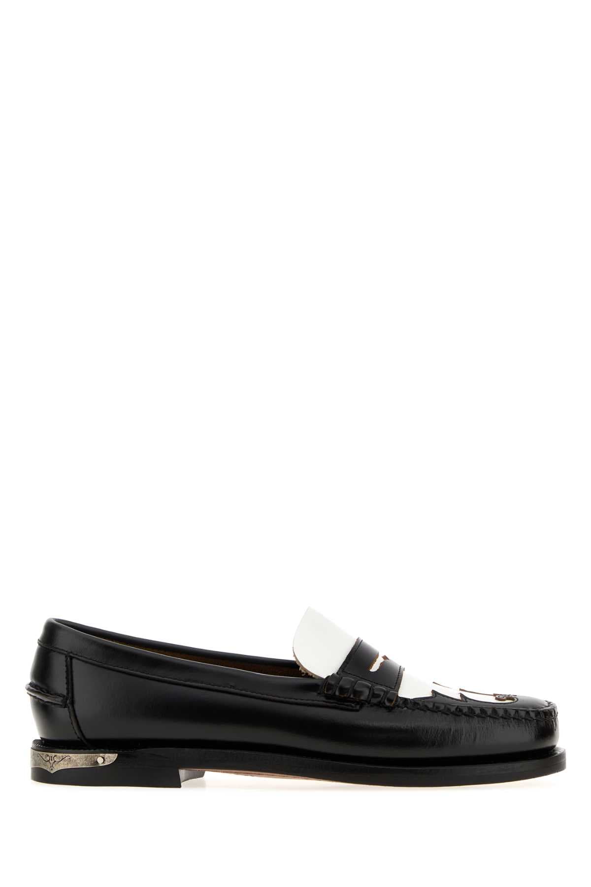 Black leather Dan Scarabeo loafers