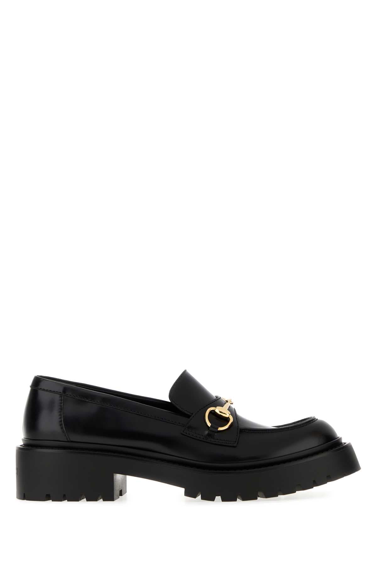 Black leather loafers