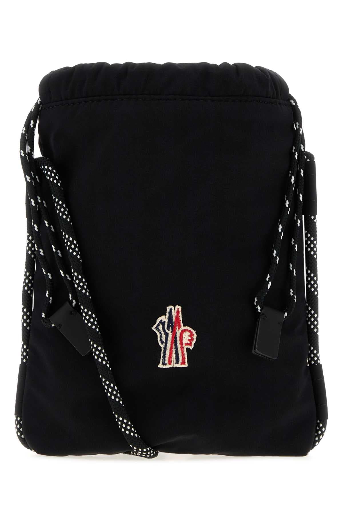 Black fabric Makaio crossbody bag