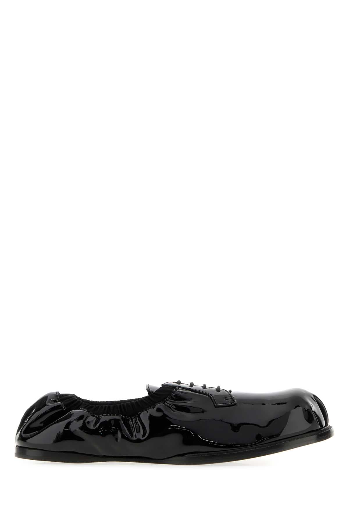 Black leather lace-up shoes