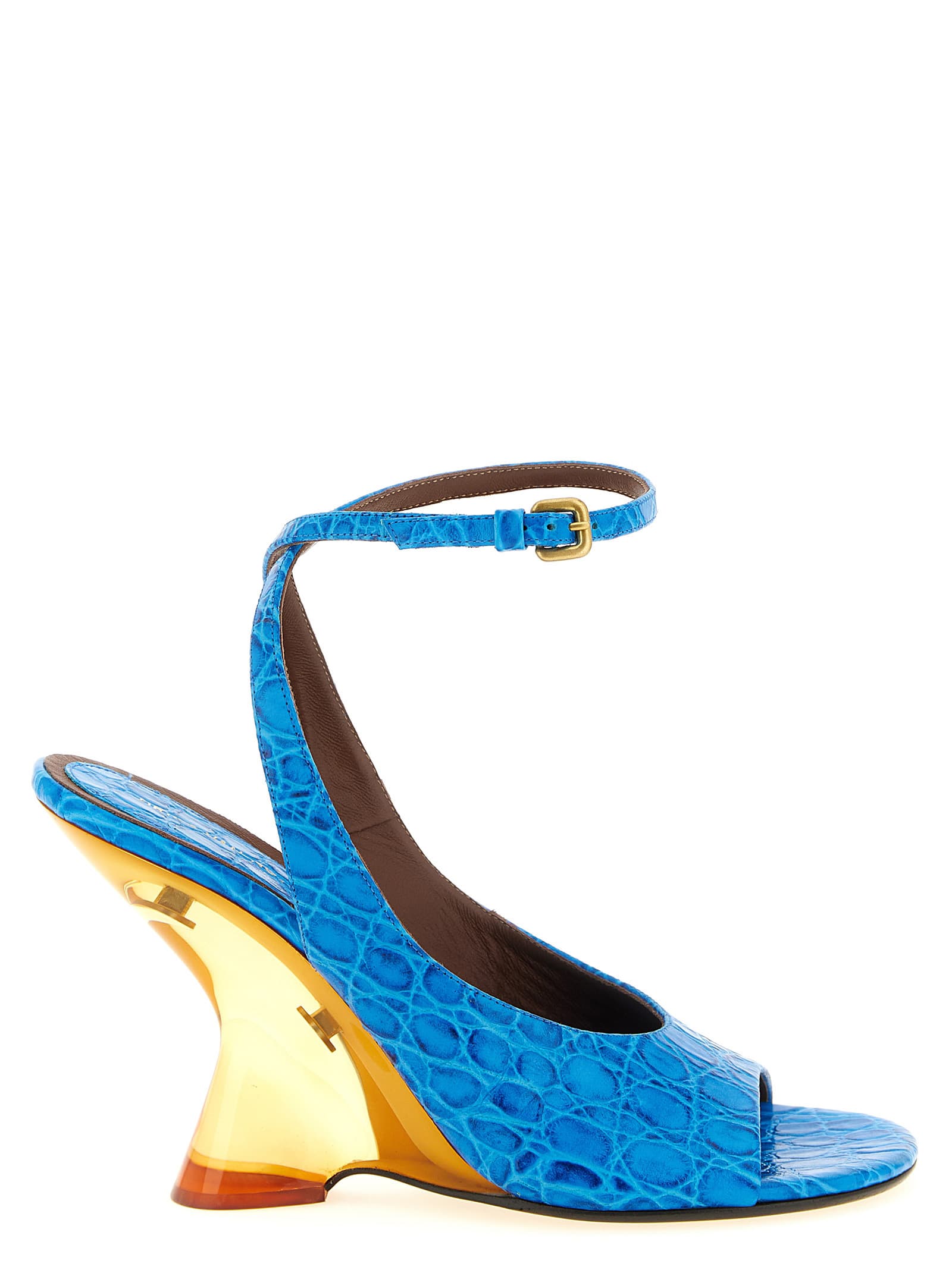 Тиснені шкіряні сандалі