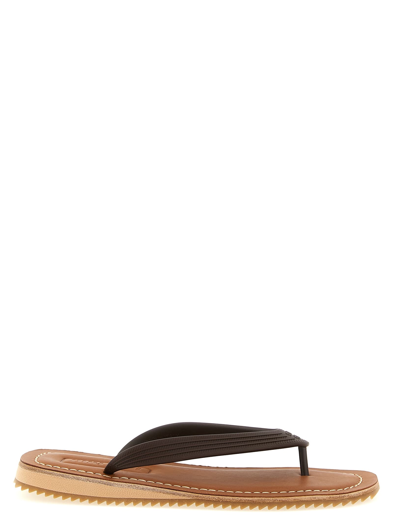 Резинові та шкіряні шльопанці