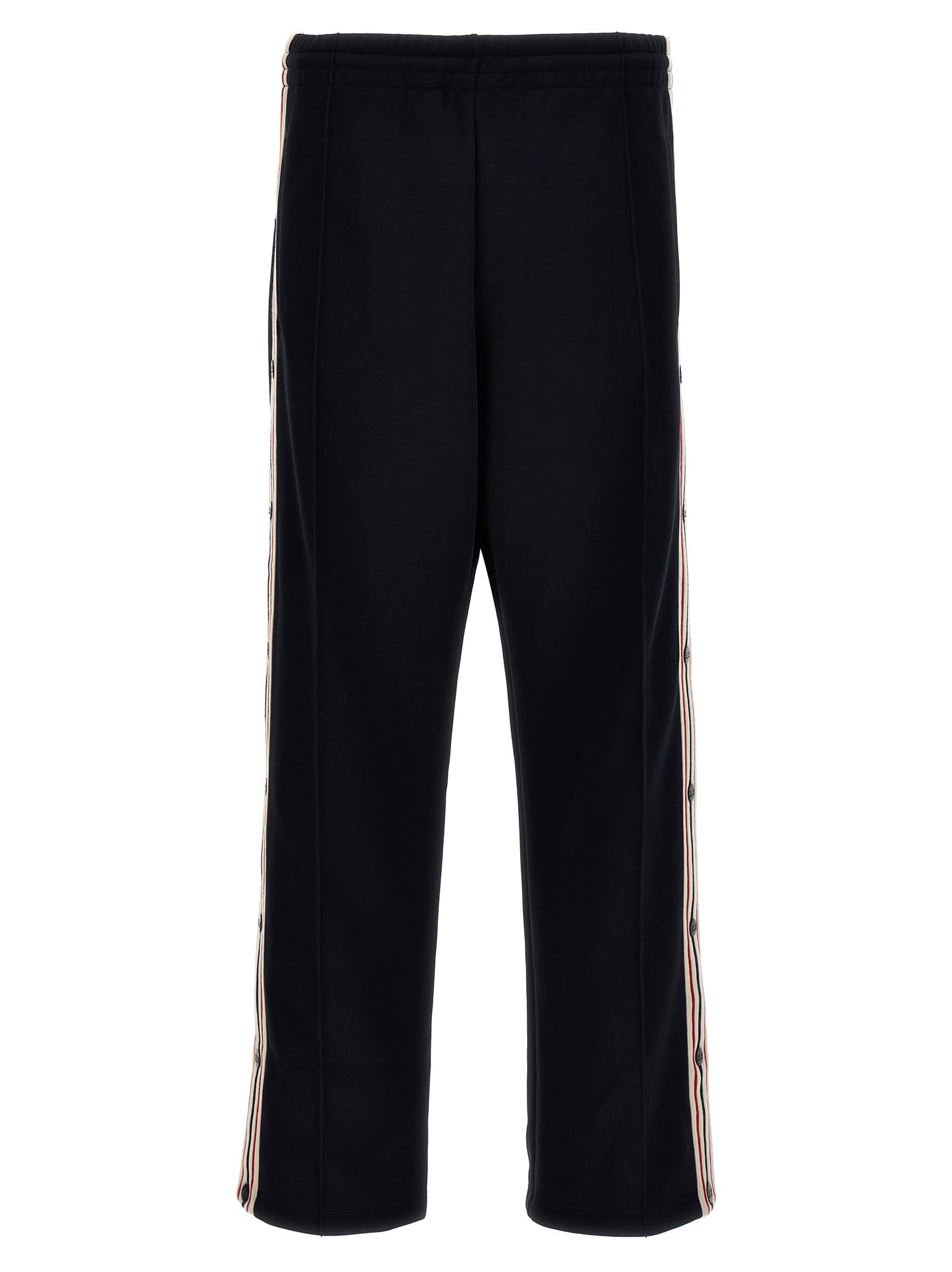 Спортивні штани з бічними смугами