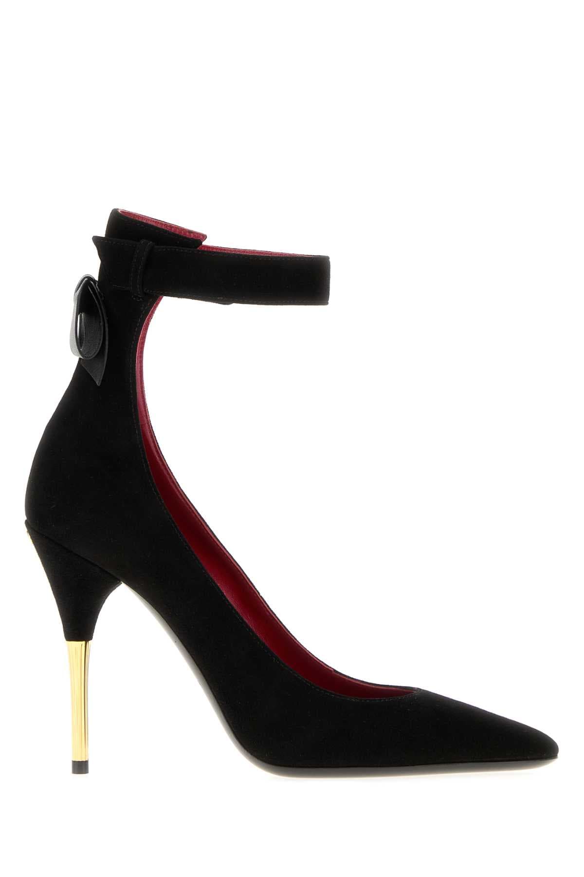 Black suede pumps