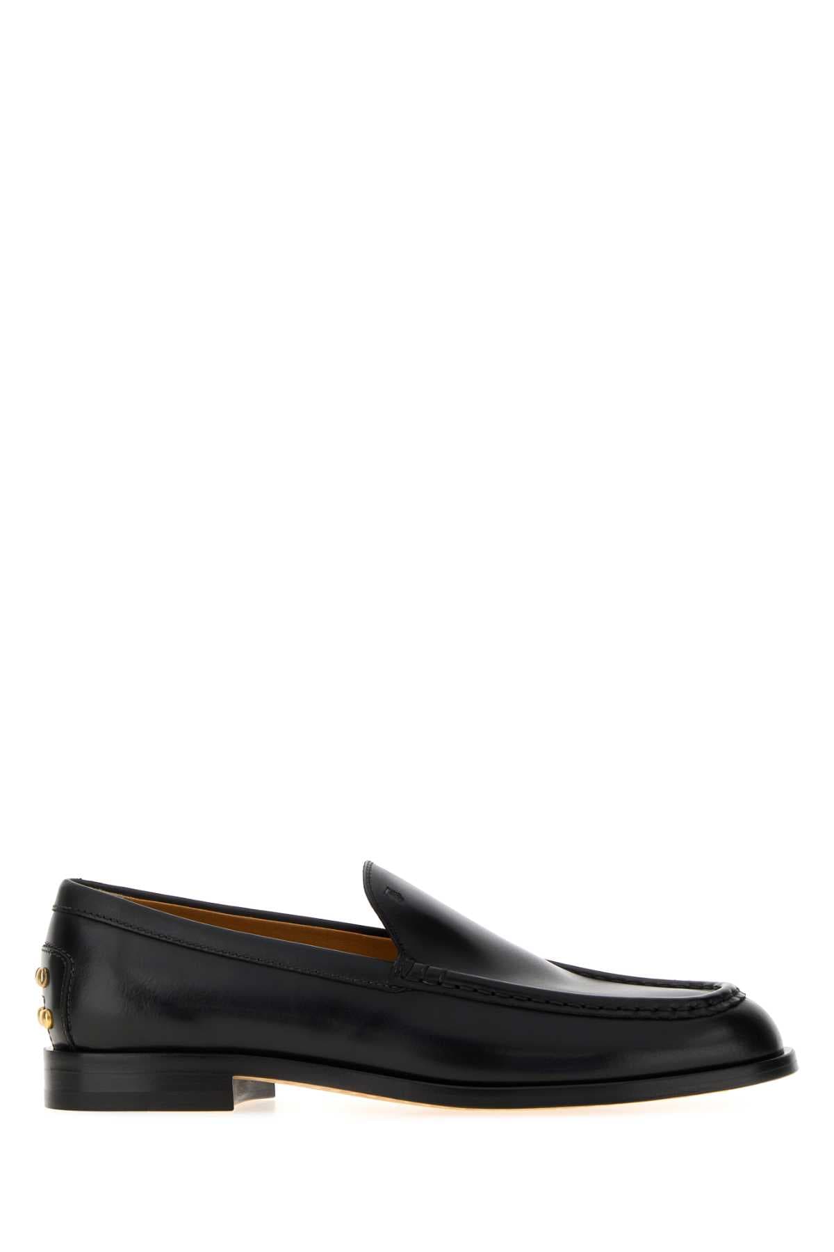 Black leather loafers